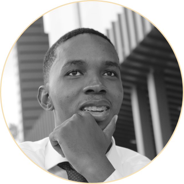 lamonte-scott-stares-forward-smilling-by-TAMUT-BASS-building