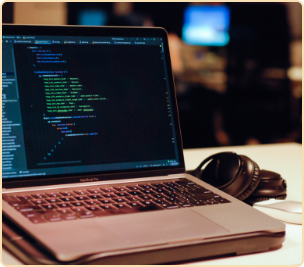 Laptop headphones on table.